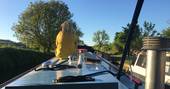 Take in incredible views of the canal atop Hunky Dory boat in Somerset