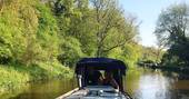 Enjoy a sunny boat ride along the canal at Hunky Dory Days near Bath
