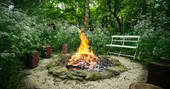Outdoor Fire Pit and seating area at Old Mill Treehouse, Bath & N.E Somerset