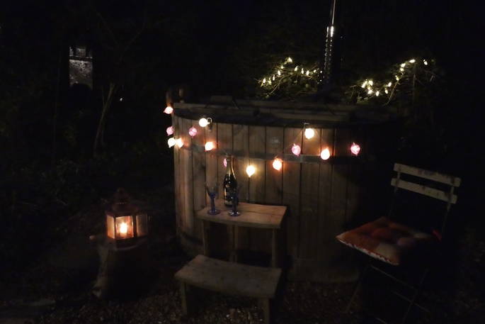 A night time hot tub session at Hazel Tree Cabin in Buckinghamshire