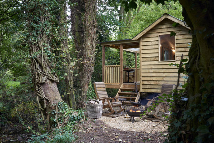 hazel tree cabin chiltern yurt retreat hot tub outside seating with firepit