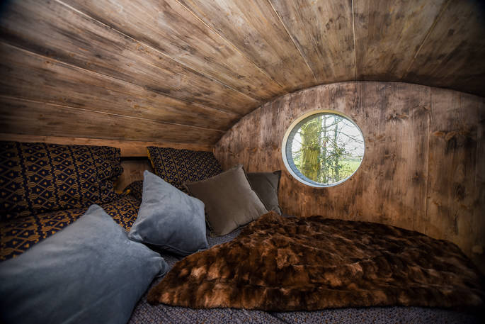 Two single mattresses above the main living area inside Faraway Treehouse