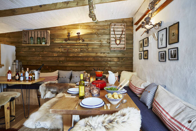 A feast for four in the cosy cabin room at Brownscombe in Devon