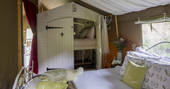 Double bed and child bunk bed at Longlands safari tents at Combe Martin, North Devon