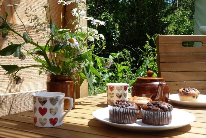 Tea and muffins on the table at Cider Orchard Yurt, Ragmans Lane Farm