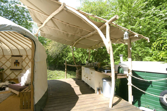 Sapperton Yurt covered outside deck and kitchen at Westley Farm in Gloucestershire