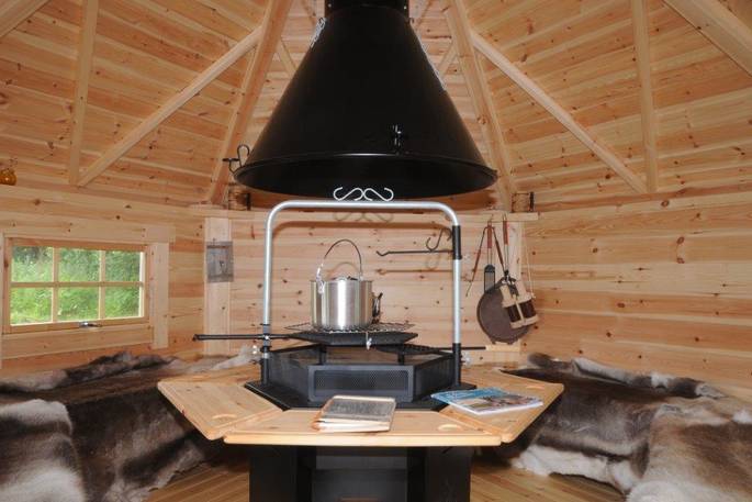 Relax and stay cosy on the fluffy throws as you enjoy a hot cup of tea inside the hobbit hut at Munday's Meadow in Gloucestershire