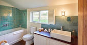 Mosaic Cabin bathroom with bath tub, Herefordshire Hideaways, Ledicot, Shobdon, Herefordshire