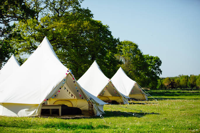 Share the bell tents at The Fire Pit Camp with friends or family and enjoy a private festival in Norfolk