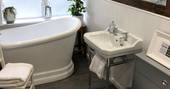 The Waiting Room bathroom with bath tub, Staward Station at Langley upon Tyne, Hexham, Northumberland