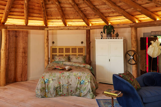 Interior of the cabin with huge bed