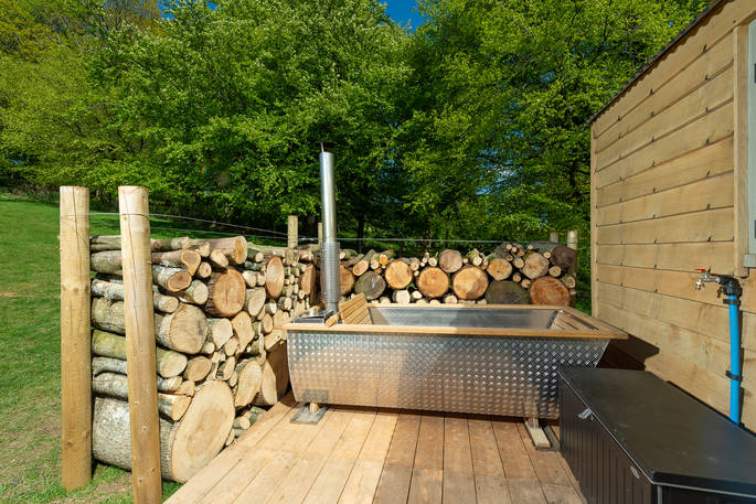 Wood fired bath tub