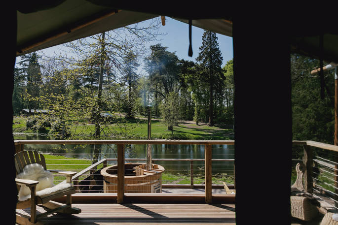 Sit outside of The Woodmans Lodge and fire up the hot tub at The Lost Garden Retreat in Suffolk