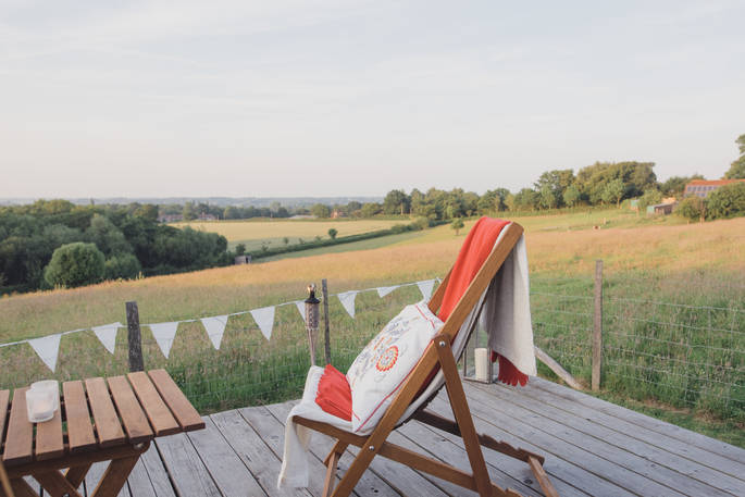 Book the hill top tent for a special occasion with family with views over the Sussex Downs from Swallowtail Hill