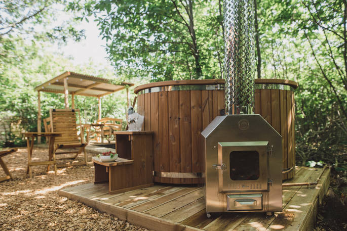 Take a dip and relax in your own private wood fired hot tub at the Sussex Round House in Sussex