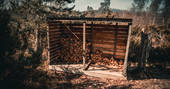 Chop some fresh wood for your log-burner at The Bothy Project in Highland, Scotland