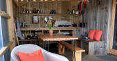 The Hide cabin - outdoor covered dining and cooking area, One Cat Farm, Ceredigion, Wales