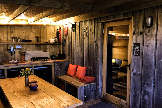 The Hide cabin outdoors covered kitchen area, One Cat Farm, Ceredigion, Wales