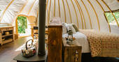 Inside the cosy and charming The Slades tent at Penhein Glamping in Monmouthshire