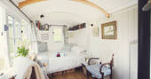 Argoed Shepherds Hut light and airy interior with double bed 