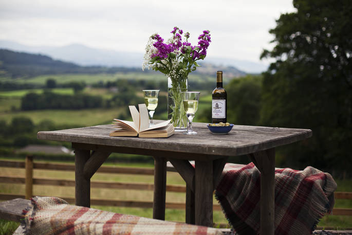 Table with wine and flowers