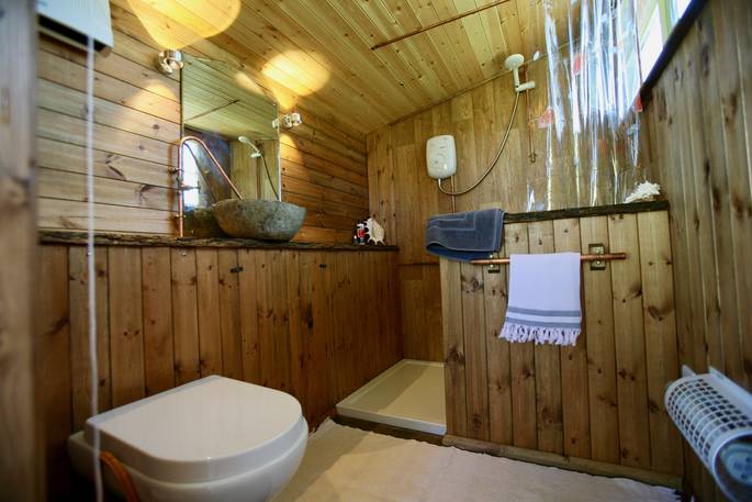 Hot shower and flushing toilet inside of the shower shack near The Duck Hut 