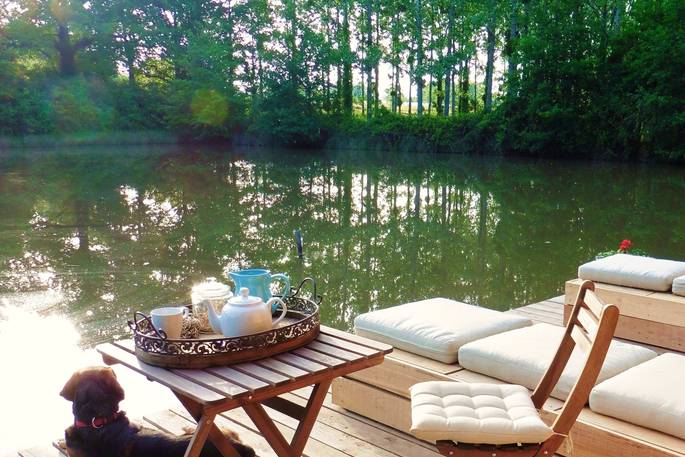Sit out on the deck with a cup of tea at Caru Cabin in Dordogne, France