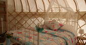 Double bed at Cherry Blossom Yurt, Haute-Loire