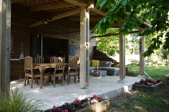 Cabane dans les bois at Coutillard in France with covered veranda for al fresco dining 